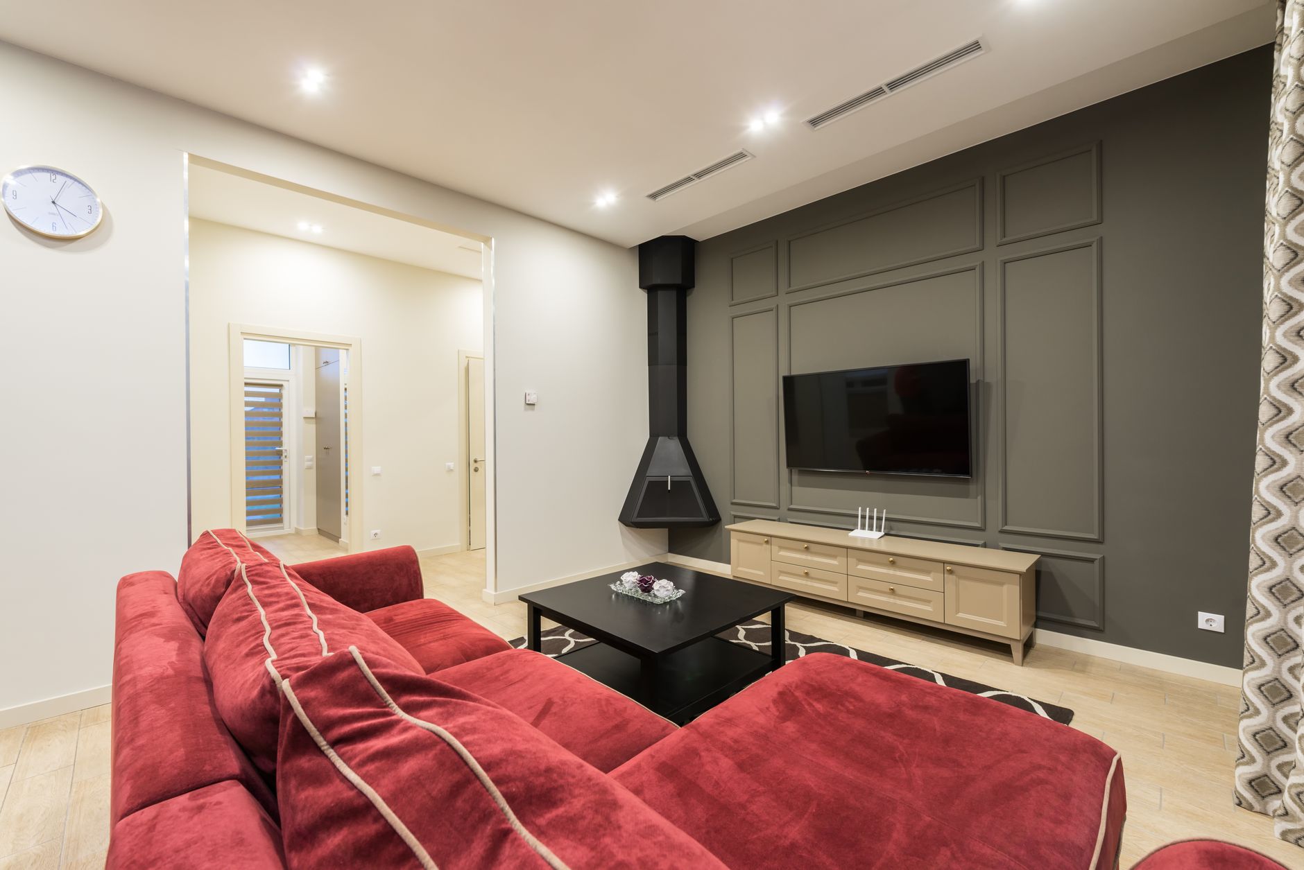 TV mounted on living room wall